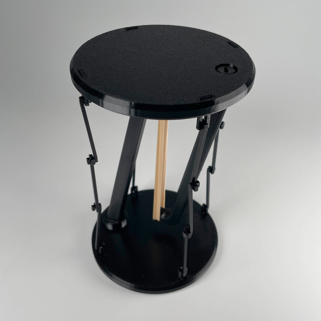 Tensegrity Display Stand — A puzzle-built stand that looks like it shouldn’t work