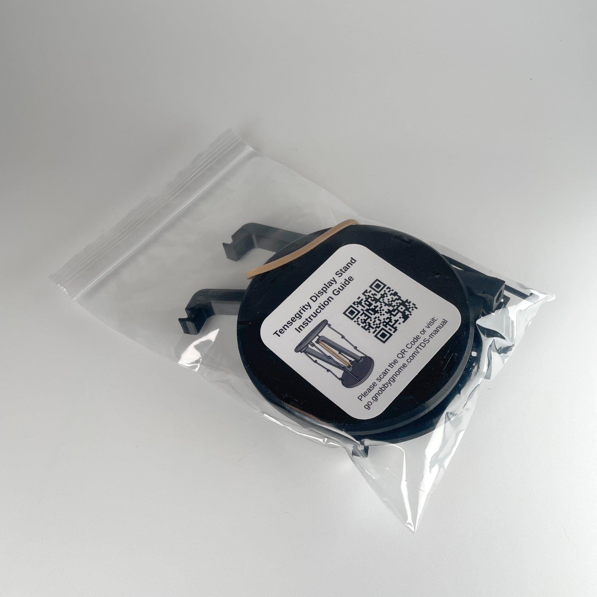 Tensegrity Display Stand — A puzzle-built stand that looks like it shouldn’t work