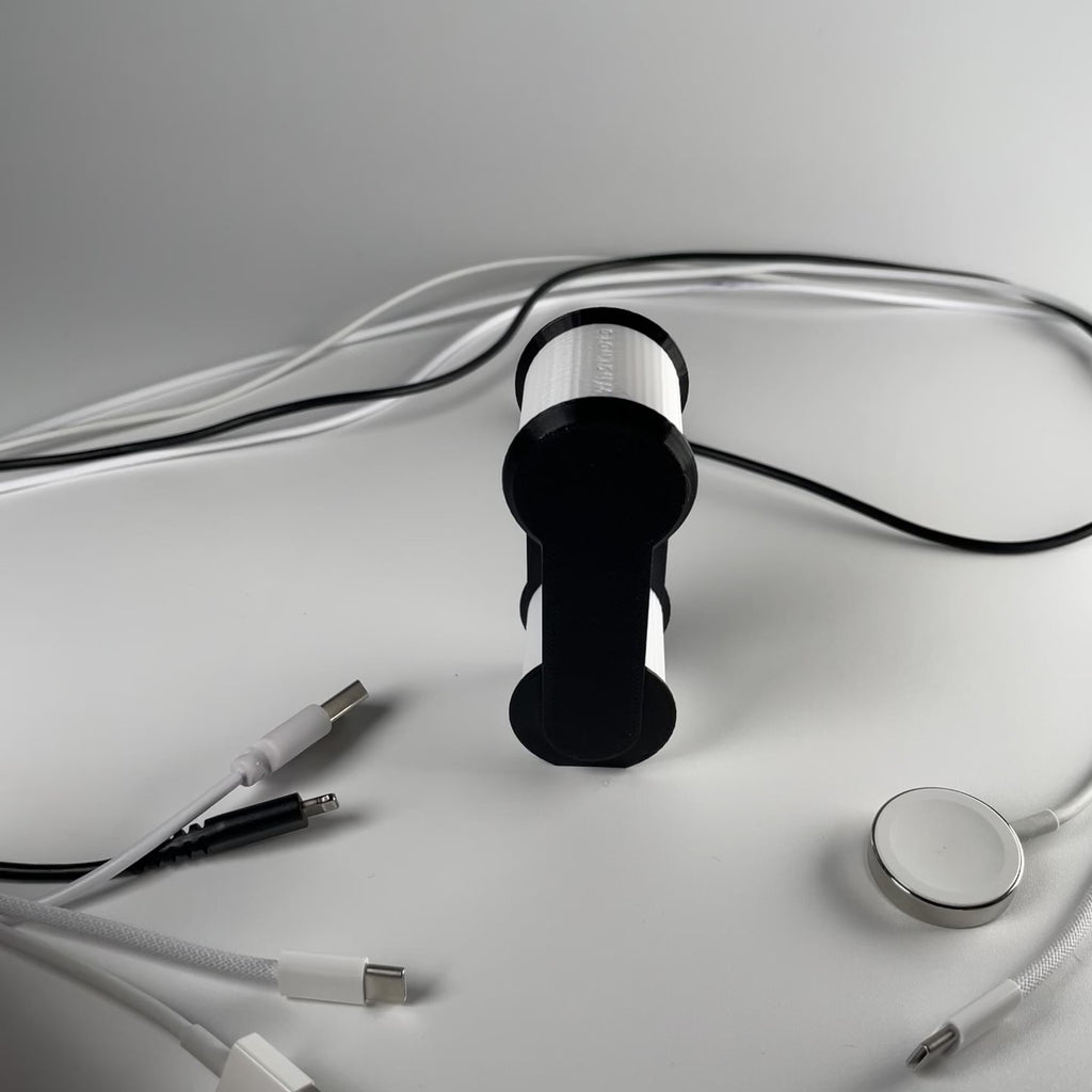 Cable Keeper – Figure-8 winder that prevents twist buildup and sharp kinks